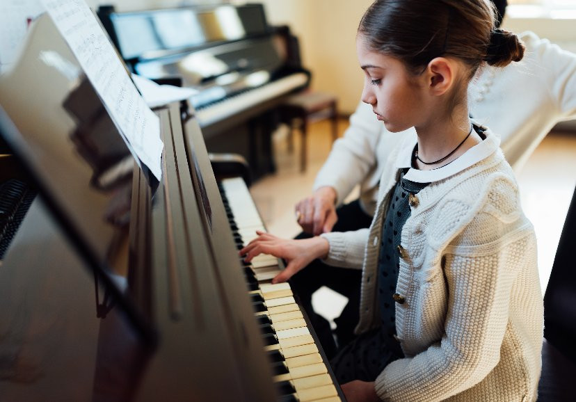52339640 Girl Playing A Piano